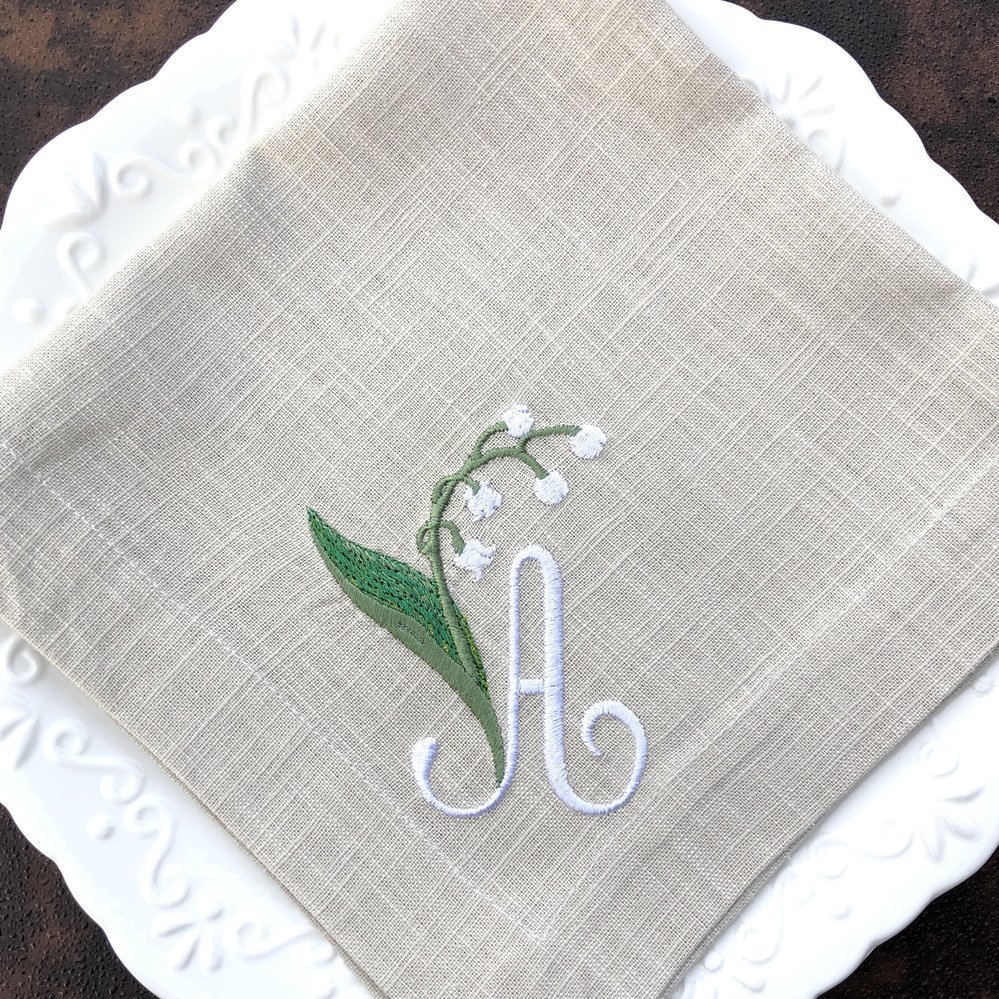 https://bellelinen.com/img/p/1000-lily-of-the-valley-monogram-napkin-1653673993.jpg