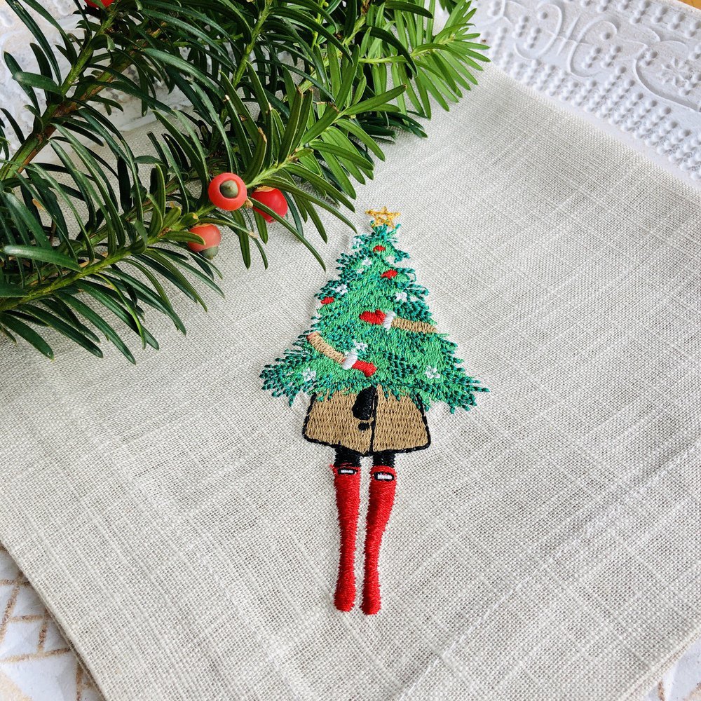 Modern Girl Holding Christmas Tree Linen Napkin